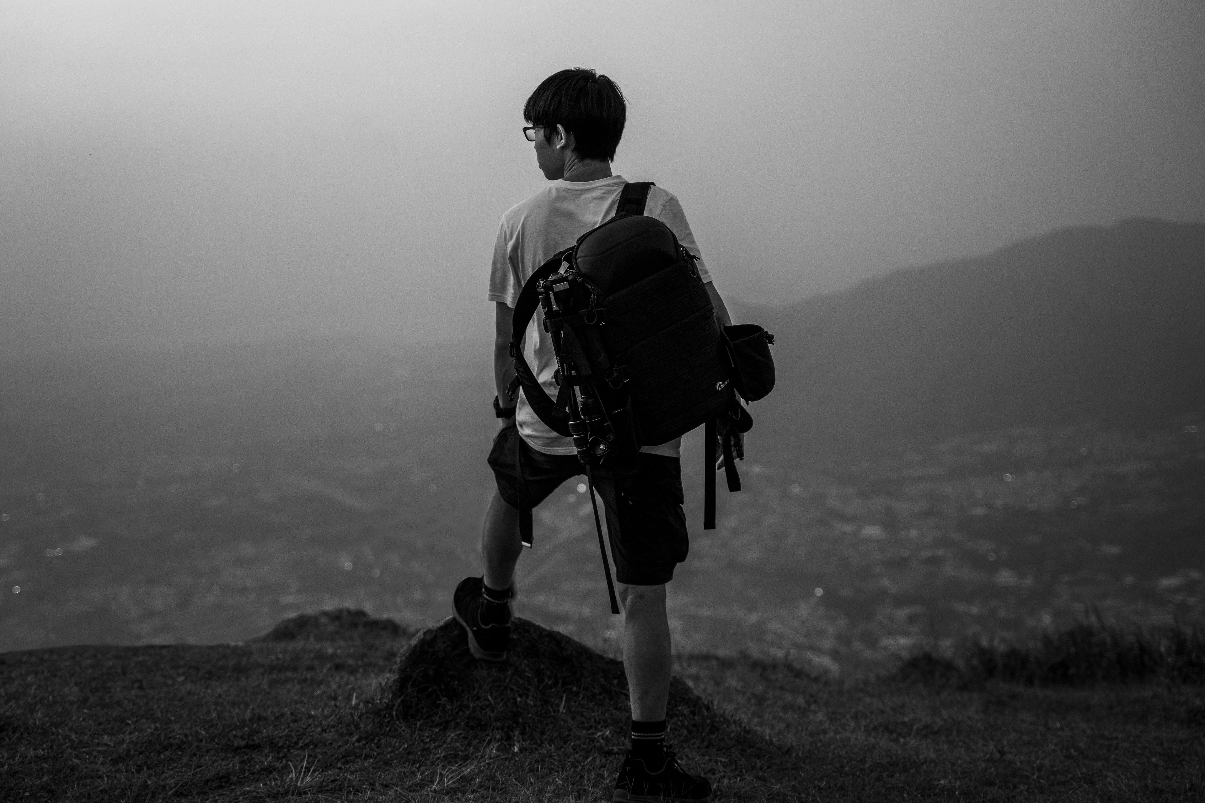 The back of Jonathan Ho on the edge of Tai Mo Shan